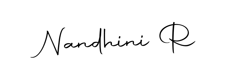 Use a signature maker to create a handwritten signature online. With this signature software, you can design (Autography-DOLnW) your own signature for name Nandhini R. Nandhini R signature style 10 images and pictures png