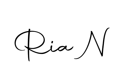 How to make Ria N name signature. Use Autography-DOLnW style for creating short signs online. This is the latest handwritten sign. Ria N signature style 10 images and pictures png