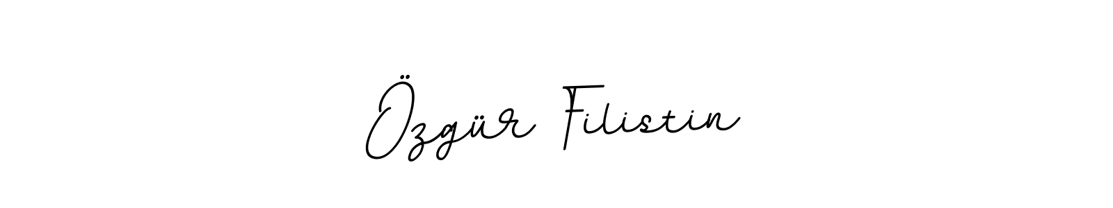 How to make Özgür Filistin name signature. Use BallpointsItalic-DORy9 style for creating short signs online. This is the latest handwritten sign. Özgür Filistin signature style 11 images and pictures png