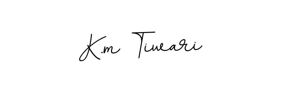 Make a beautiful signature design for name K.m Tiwari. With this signature (BallpointsItalic-DORy9) style, you can create a handwritten signature for free. K.m Tiwari signature style 11 images and pictures png