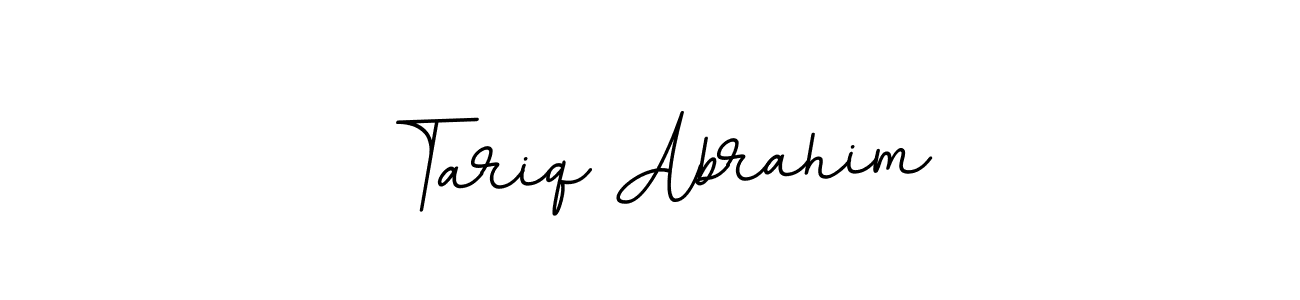 You should practise on your own different ways (BallpointsItalic-DORy9) to write your name (Tariq Abrahim) in signature. don't let someone else do it for you. Tariq Abrahim signature style 11 images and pictures png