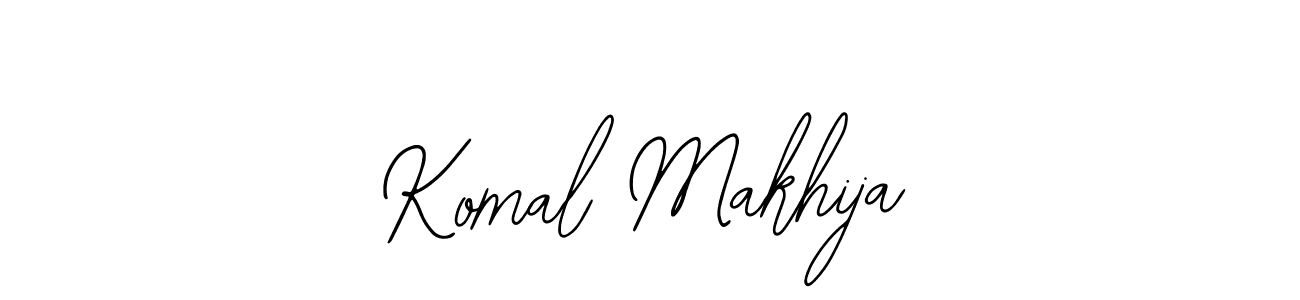 You should practise on your own different ways (Bearetta-2O07w) to write your name (Komal Makhija) in signature. don't let someone else do it for you. Komal Makhija signature style 12 images and pictures png