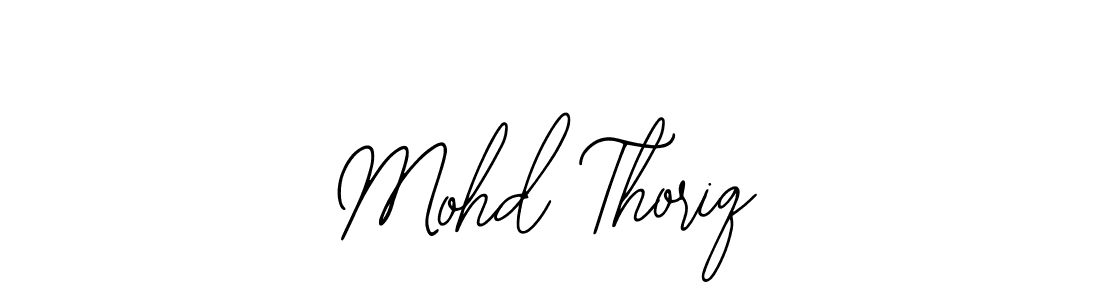 This is the best signature style for the Mohd Thoriq name. Also you like these signature font (Bearetta-2O07w). Mix name signature. Mohd Thoriq signature style 12 images and pictures png
