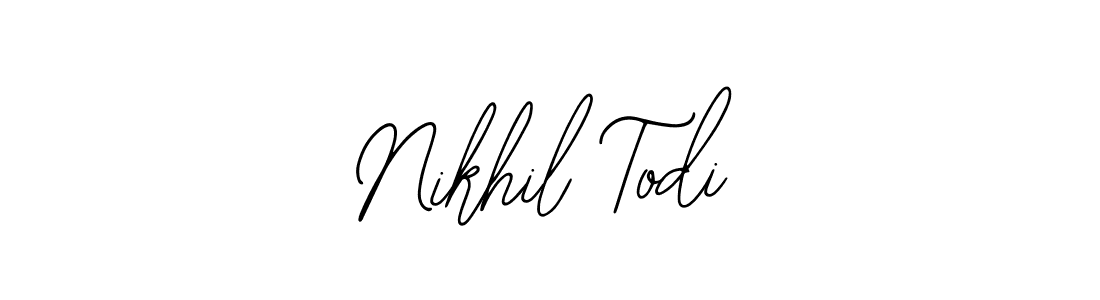 You should practise on your own different ways (Bearetta-2O07w) to write your name (Nikhil Todi) in signature. don't let someone else do it for you. Nikhil Todi signature style 12 images and pictures png