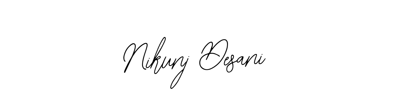 You should practise on your own different ways (Bearetta-2O07w) to write your name (Nikunj Desani) in signature. don't let someone else do it for you. Nikunj Desani signature style 12 images and pictures png