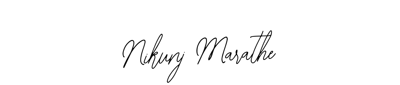 How to make Nikunj Marathe name signature. Use Bearetta-2O07w style for creating short signs online. This is the latest handwritten sign. Nikunj Marathe signature style 12 images and pictures png