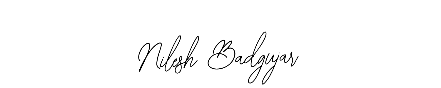 You should practise on your own different ways (Bearetta-2O07w) to write your name (Nilesh Badgujar) in signature. don't let someone else do it for you. Nilesh Badgujar signature style 12 images and pictures png