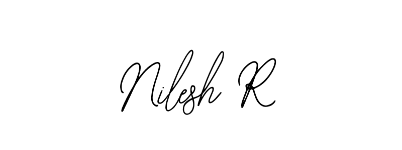 You should practise on your own different ways (Bearetta-2O07w) to write your name (Nilesh R) in signature. don't let someone else do it for you. Nilesh R signature style 12 images and pictures png