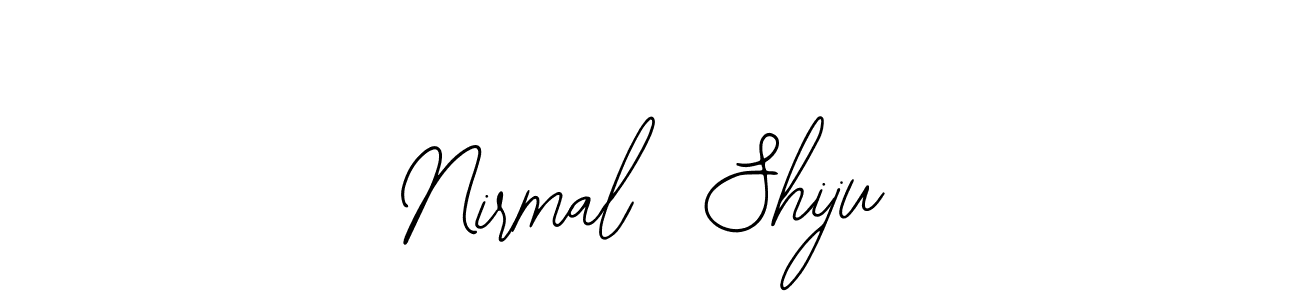 This is the best signature style for the Nirmal  Shiju name. Also you like these signature font (Bearetta-2O07w). Mix name signature. Nirmal  Shiju signature style 12 images and pictures png