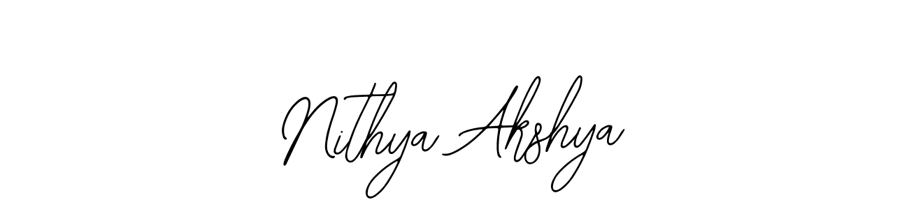 Also You can easily find your signature by using the search form. We will create Nithya Akshya name handwritten signature images for you free of cost using Bearetta-2O07w sign style. Nithya Akshya signature style 12 images and pictures png
