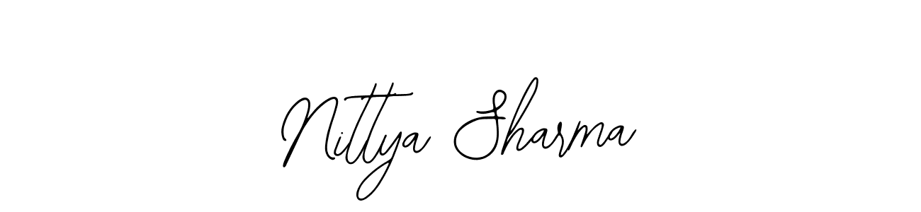 How to make Nittya Sharma name signature. Use Bearetta-2O07w style for creating short signs online. This is the latest handwritten sign. Nittya Sharma signature style 12 images and pictures png