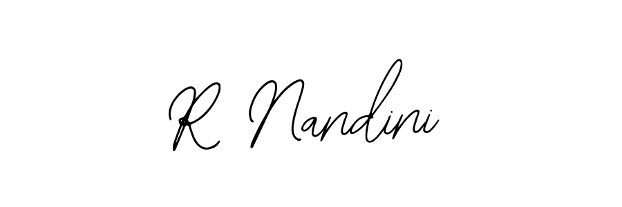 The best way (Bearetta-2O07w) to make a short signature is to pick only two or three words in your name. The name R Nandini include a total of six letters. For converting this name. R Nandini signature style 12 images and pictures png