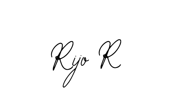 You should practise on your own different ways (Bearetta-2O07w) to write your name (Rijo R) in signature. don't let someone else do it for you. Rijo R signature style 12 images and pictures png