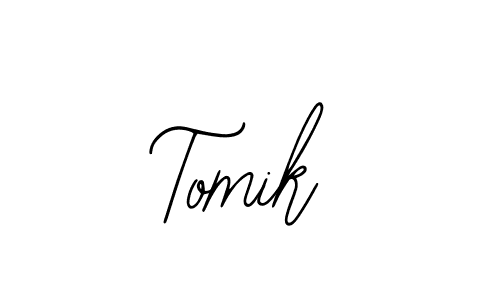 Create a beautiful signature design for name Tomik. With this signature (Bearetta-2O07w) fonts, you can make a handwritten signature for free. Tomik signature style 12 images and pictures png