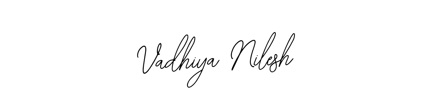 Create a beautiful signature design for name Vadhiya Nilesh. With this signature (Bearetta-2O07w) fonts, you can make a handwritten signature for free. Vadhiya Nilesh signature style 12 images and pictures png
