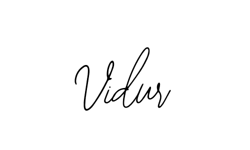 Use a signature maker to create a handwritten signature online. With this signature software, you can design (Bearetta-2O07w) your own signature for name Vidur. Vidur signature style 12 images and pictures png