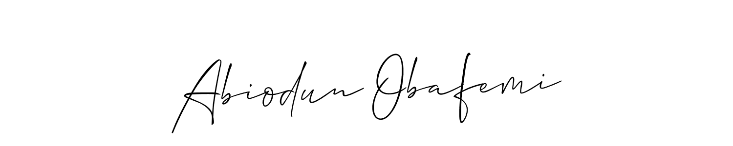 How to make Abiodun Obafemi name signature. Use Allison_Script style for creating short signs online. This is the latest handwritten sign. Abiodun Obafemi signature style 2 images and pictures png