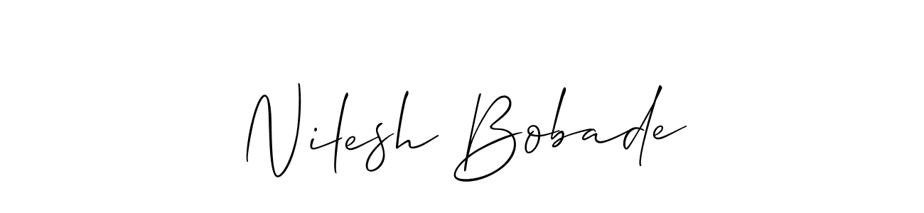 You should practise on your own different ways (Allison_Script) to write your name (Nilesh Bobade) in signature. don't let someone else do it for you. Nilesh Bobade signature style 2 images and pictures png