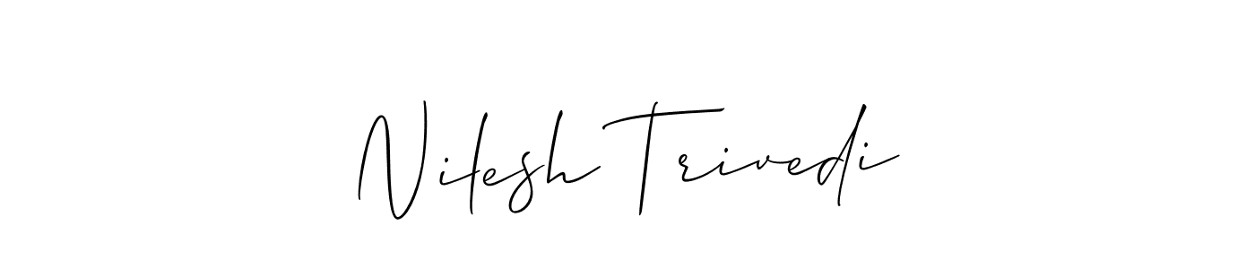 This is the best signature style for the Nilesh Trivedi name. Also you like these signature font (Allison_Script). Mix name signature. Nilesh Trivedi signature style 2 images and pictures png