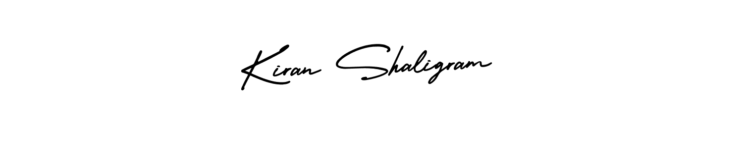 You should practise on your own different ways (AmerikaSignatureDemo-Regular) to write your name (Kiran Shaligram) in signature. don't let someone else do it for you. Kiran Shaligram signature style 3 images and pictures png