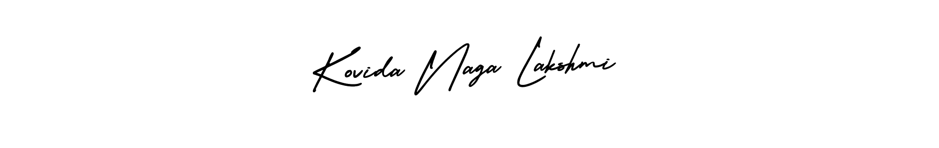 You should practise on your own different ways (AmerikaSignatureDemo-Regular) to write your name (Kovida Naga Lakshmi) in signature. don't let someone else do it for you. Kovida Naga Lakshmi signature style 3 images and pictures png