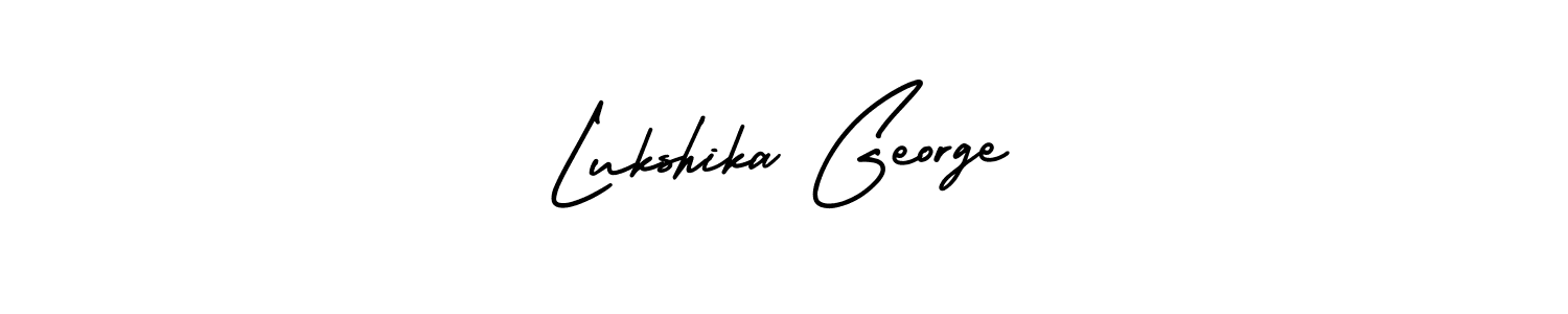 How to make Lukshika George name signature. Use AmerikaSignatureDemo-Regular style for creating short signs online. This is the latest handwritten sign. Lukshika George signature style 3 images and pictures png