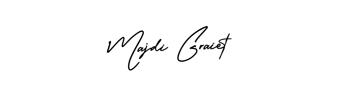 How to make Majdi Graiet name signature. Use AmerikaSignatureDemo-Regular style for creating short signs online. This is the latest handwritten sign. Majdi Graiet signature style 3 images and pictures png