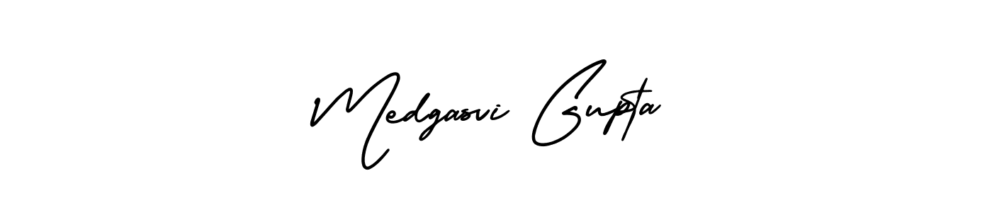 Medgasvi Gupta stylish signature style. Best Handwritten Sign (AmerikaSignatureDemo-Regular) for my name. Handwritten Signature Collection Ideas for my name Medgasvi Gupta. Medgasvi Gupta signature style 3 images and pictures png