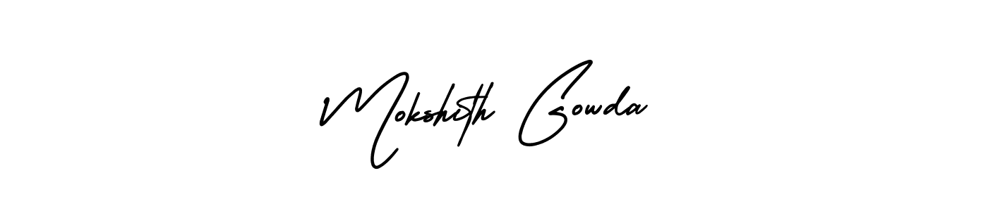 You should practise on your own different ways (AmerikaSignatureDemo-Regular) to write your name (Mokshith Gowda) in signature. don't let someone else do it for you. Mokshith Gowda signature style 3 images and pictures png