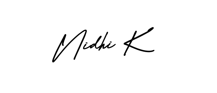Make a beautiful signature design for name Nidhi K. With this signature (AmerikaSignatureDemo-Regular) style, you can create a handwritten signature for free. Nidhi K signature style 3 images and pictures png