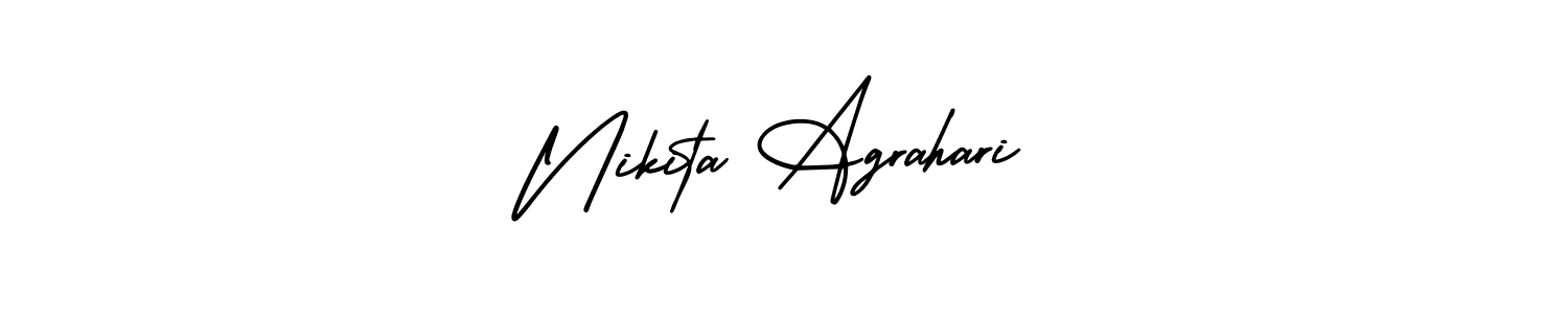 You should practise on your own different ways (AmerikaSignatureDemo-Regular) to write your name (Nikita Agrahari) in signature. don't let someone else do it for you. Nikita Agrahari signature style 3 images and pictures png