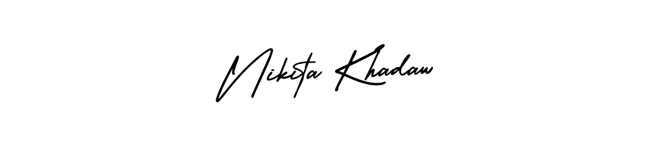 You should practise on your own different ways (AmerikaSignatureDemo-Regular) to write your name (Nikita Khadaw) in signature. don't let someone else do it for you. Nikita Khadaw signature style 3 images and pictures png