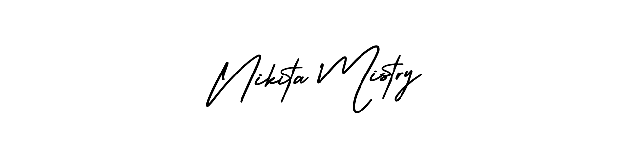 Nikita Mistry stylish signature style. Best Handwritten Sign (AmerikaSignatureDemo-Regular) for my name. Handwritten Signature Collection Ideas for my name Nikita Mistry. Nikita Mistry signature style 3 images and pictures png