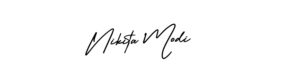 You should practise on your own different ways (AmerikaSignatureDemo-Regular) to write your name (Nikita Modi) in signature. don't let someone else do it for you. Nikita Modi signature style 3 images and pictures png
