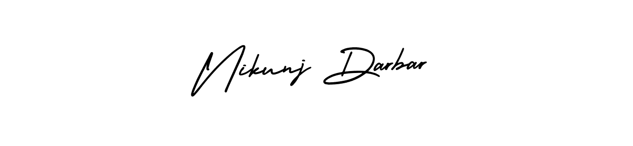 You should practise on your own different ways (AmerikaSignatureDemo-Regular) to write your name (Nikunj Darbar) in signature. don't let someone else do it for you. Nikunj Darbar signature style 3 images and pictures png