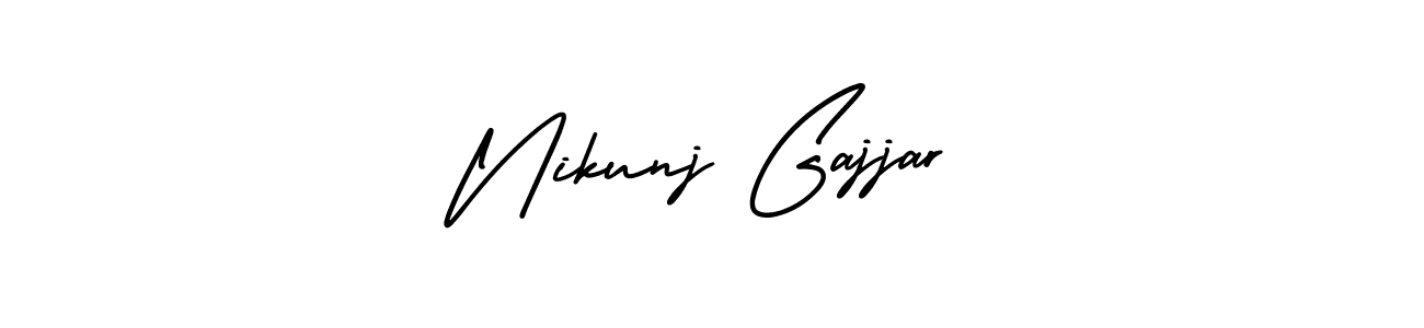 Make a beautiful signature design for name Nikunj Gajjar. With this signature (AmerikaSignatureDemo-Regular) style, you can create a handwritten signature for free. Nikunj Gajjar signature style 3 images and pictures png