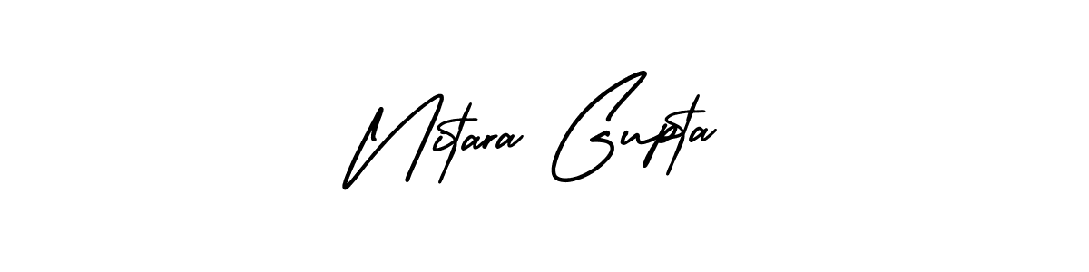 You should practise on your own different ways (AmerikaSignatureDemo-Regular) to write your name (Nitara Gupta) in signature. don't let someone else do it for you. Nitara Gupta signature style 3 images and pictures png