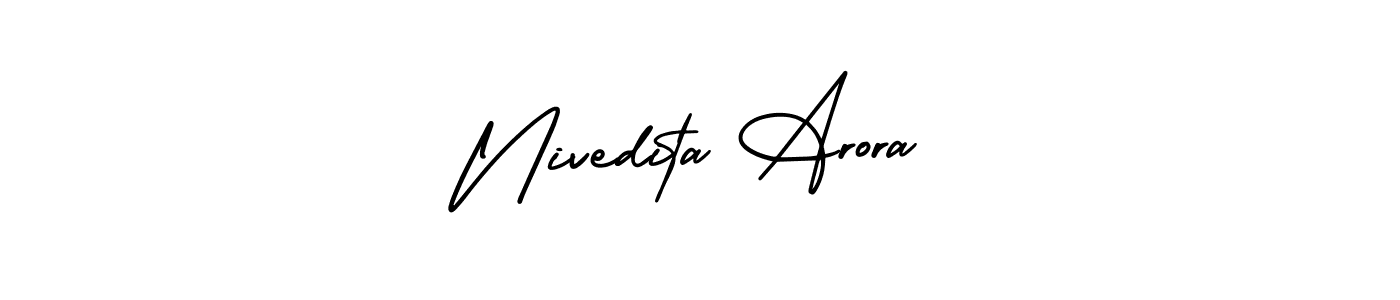 How to make Nivedita Arora signature? AmerikaSignatureDemo-Regular is a professional autograph style. Create handwritten signature for Nivedita Arora name. Nivedita Arora signature style 3 images and pictures png