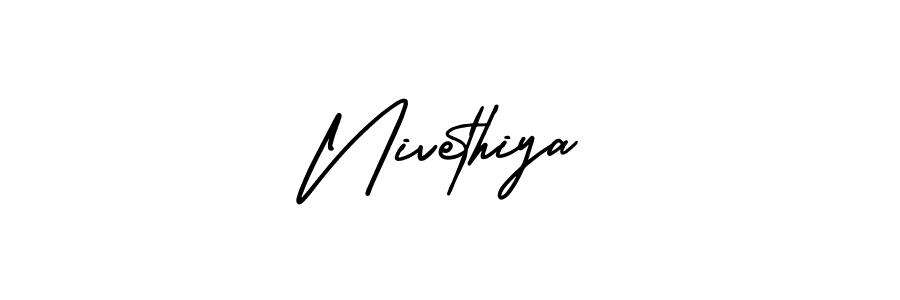 Nivethiya stylish signature style. Best Handwritten Sign (AmerikaSignatureDemo-Regular) for my name. Handwritten Signature Collection Ideas for my name Nivethiya. Nivethiya signature style 3 images and pictures png