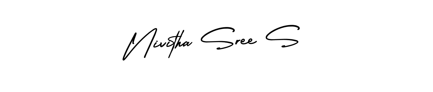 You should practise on your own different ways (AmerikaSignatureDemo-Regular) to write your name (Nivitha Sree S) in signature. don't let someone else do it for you. Nivitha Sree S signature style 3 images and pictures png