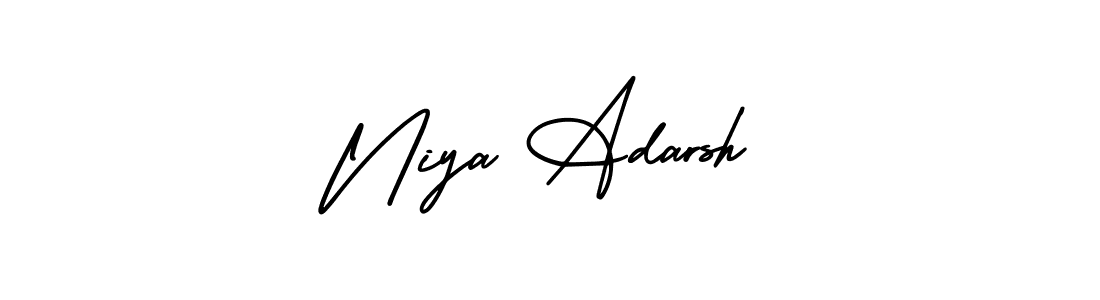 How to make Niya Adarsh name signature. Use AmerikaSignatureDemo-Regular style for creating short signs online. This is the latest handwritten sign. Niya Adarsh signature style 3 images and pictures png