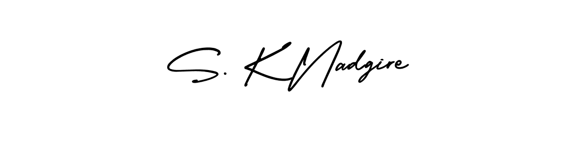 You should practise on your own different ways (AmerikaSignatureDemo-Regular) to write your name (S. K Nadgire) in signature. don't let someone else do it for you. S. K Nadgire signature style 3 images and pictures png