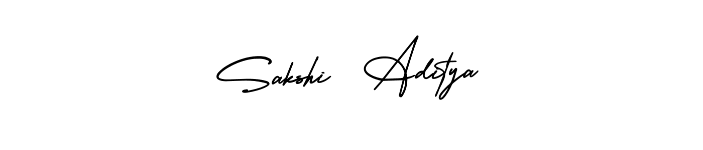 You should practise on your own different ways (AmerikaSignatureDemo-Regular) to write your name (Sakshi  Aditya) in signature. don't let someone else do it for you. Sakshi  Aditya signature style 3 images and pictures png