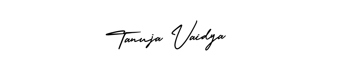 You should practise on your own different ways (AmerikaSignatureDemo-Regular) to write your name (Tanuja Vaidya) in signature. don't let someone else do it for you. Tanuja Vaidya signature style 3 images and pictures png