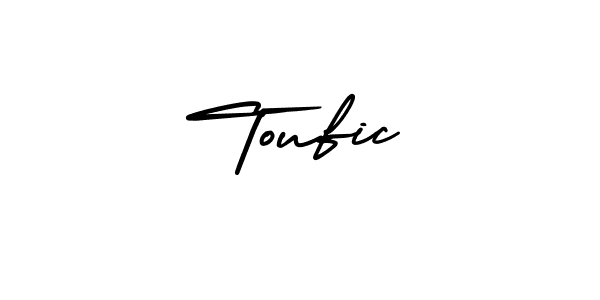 Toufic stylish signature style. Best Handwritten Sign (AmerikaSignatureDemo-Regular) for my name. Handwritten Signature Collection Ideas for my name Toufic. Toufic signature style 3 images and pictures png