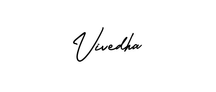 You should practise on your own different ways (AmerikaSignatureDemo-Regular) to write your name (Vivedha) in signature. don't let someone else do it for you. Vivedha signature style 3 images and pictures png