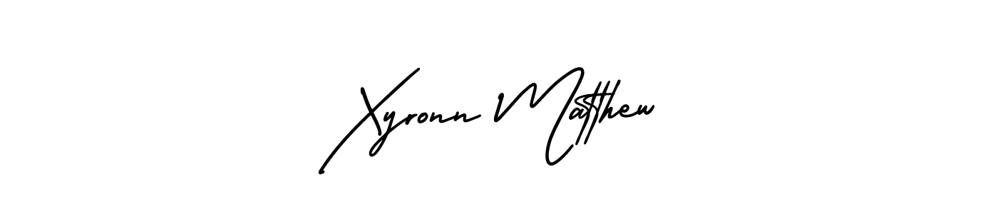 Xyronn Matthew stylish signature style. Best Handwritten Sign (AmerikaSignatureDemo-Regular) for my name. Handwritten Signature Collection Ideas for my name Xyronn Matthew. Xyronn Matthew signature style 3 images and pictures png