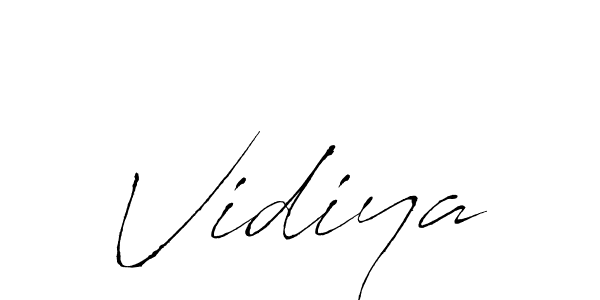 Create a beautiful signature design for name Vidiya. With this signature (Antro_Vectra) fonts, you can make a handwritten signature for free. Vidiya signature style 6 images and pictures png