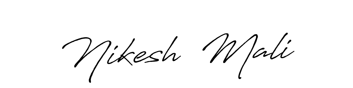 The best way (Antro_Vectra_Bolder) to make a short signature is to pick only two or three words in your name. The name Nikesh  Mali include a total of six letters. For converting this name. Nikesh  Mali signature style 7 images and pictures png