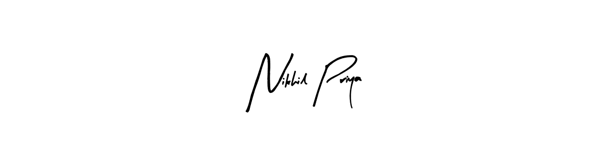 How to make Nikhil Priya name signature. Use Arty Signature style for creating short signs online. This is the latest handwritten sign. Nikhil Priya signature style 8 images and pictures png